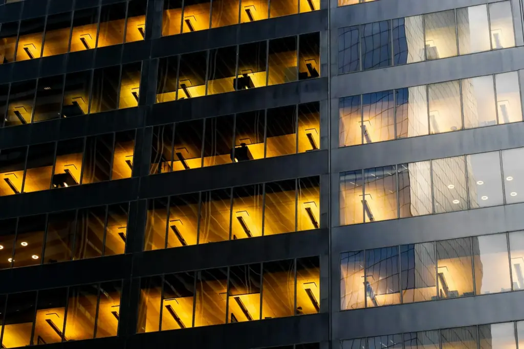 NYC commercial building of offices at night.